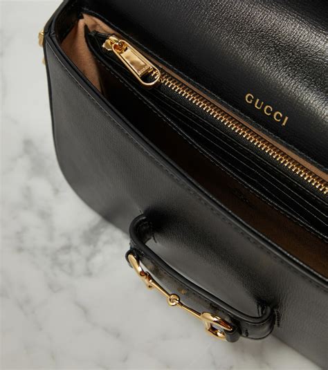 gucci horsebit 1955 leather clutch|Gucci red embossed clutch.